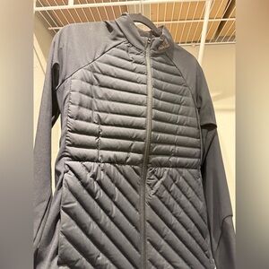 Adidas woman’s black jacket. Great for golf. Down chest and back long sleeve